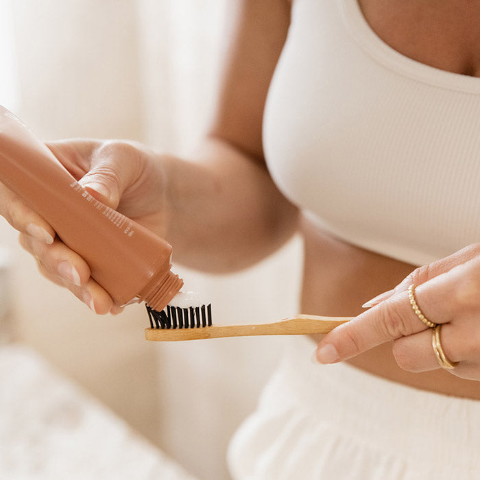 Purifying natural toothpaste with fluoride